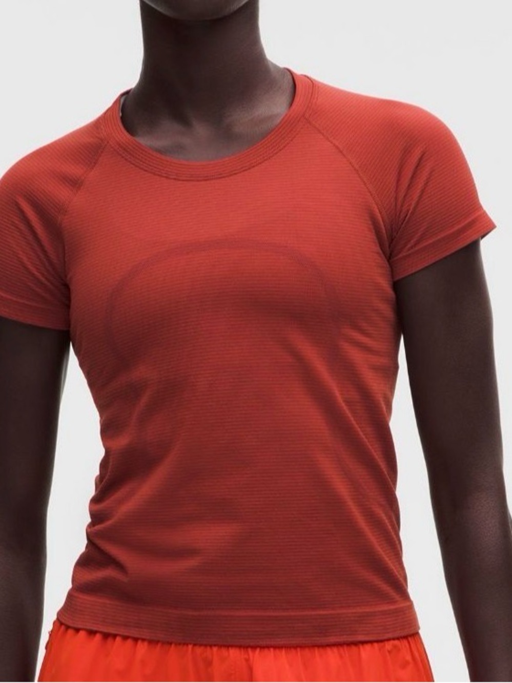 lululemon athletica swiftly Short Sleeve waist length Tee in Burnt Red